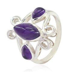 Siti purple gemstone trilogy ring with marquise and pear-shaped purple stones in silver setting