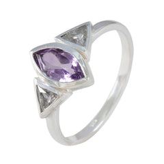 Priya silver purple gemstone trilogy ring with marquise purple center stone and triangular clear side stones