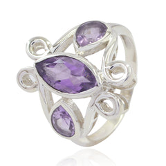 Camila purple gemstone trilogy ring with three faceted purple stones set in silver band