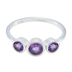 Lily silver ring featuring a purple gemstone trilogy ring design with three oval purple gemstones