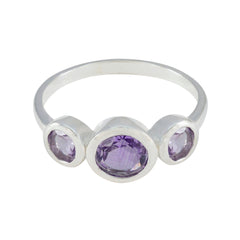 Ying silver purple gemstone trilogy ring featuring three oval purple gemstones with smooth bezel setting