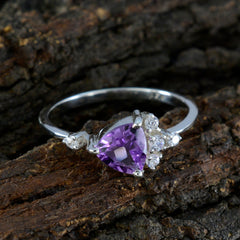 Hana purple halo gemstone ring with a triangular purple stone and small clear accent gems on silver band