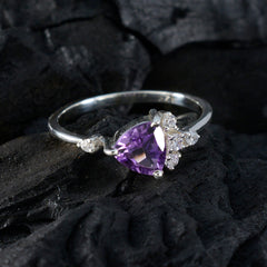 Hana purple halo gemstone ring with a triangular purple stone and small clear accent stones on a silver band