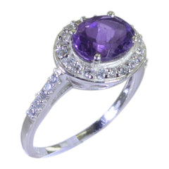 Yasmin purple halo ring with round amethyst center stone, diamond halo and pave silver band