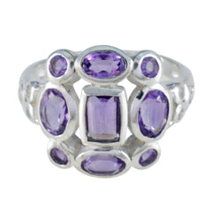 Emily purple navratna gemstone ring with multiple oval and rectangular purple gemstones set in silver
