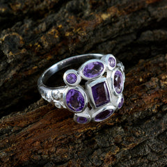 Emily purple navratna gemstone ring with multiple purple stones set in silver band