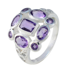 Emily purple navratna gemstone ring with multiple oval and rectangular purple stones set in silver band