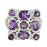 Nia purple navratna ring with multiple oval and round purple gemstones set in silver