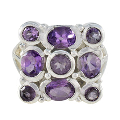 Nia purple navratna ring with multiple oval and round purple gemstones set in silver
