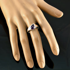 Savannah purple solitaire gemstone ring with teardrop-shaped purple stone on silver band