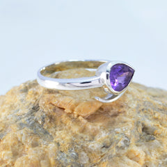Riley purple solitaire ring for women featuring a pear-shaped amethyst stone set in silver band