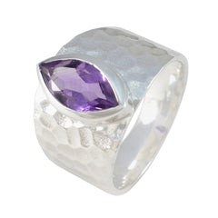 Siti purple solitaire ring with marquise cut gemstone and hammered silver band