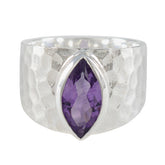 Siti silver ring featuring a marquise-cut purple solitaire ring gemstone with a hammered band design
