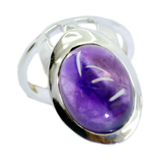 Teresa purple solitaire ring with oval amethyst cabochon set in polished sterling silver bezel band