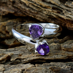 Teresa purple toi et moi ring with two pear-shaped purple gemstones set in polished silver band
