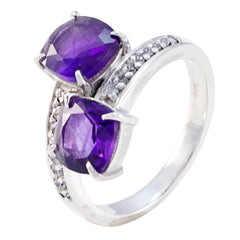 Natalia purple toi et moi ring with two faceted purple gemstones and pave diamond accents on silver band