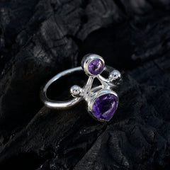 Renata purple toi et moi ring with two purple gemstones set in silver band