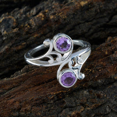 Angel silver ring with scrolling vine design and two faceted amethyst gemstones purple toi et moi ring on rustic wood