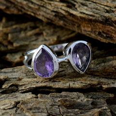 Lara silver ring featuring two teardrop gemstones in purple toi et moi ring design on rustic wood