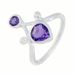 Renata purple toi et moi ring with two purple gemstones set in a silver band