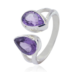 Lara purple toi et moi ring with two pear-shaped purple gemstones set in silver band