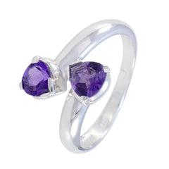 Teresa purple toi et moi ring featuring two heart-shaped purple gemstones set in silver band