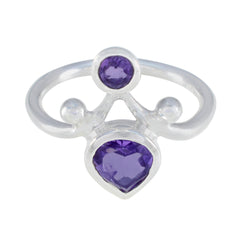 Renata silver ring featuring purple toi et moi ring design with two purple gemstones