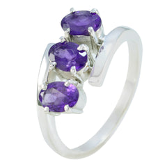Victoria purple trilogy gemstone ring in sterling silver with three oval purple gemstones and prong settings