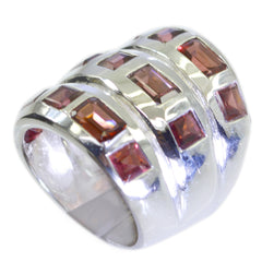 Lily silver ring set with rectangular red stones designed as a red cocktail ring for women