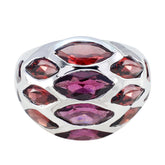 Camila red gemstone armor ring with multiple marquise-cut red and purple gemstones in silver setting
