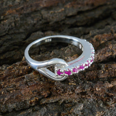 Nisa sterling 925 silver red gemstone contemporary ring with row of small pink stones on curved modern band