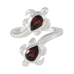 Carolina silver ring featuring two red gemstones shaped like turtles red gemstone fashion ring