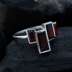 Nova red gemstone ring for women featuring three rectangular red stones set in silver band