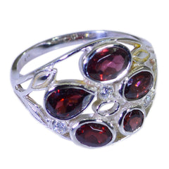 Julia red gemstone ring for women featuring multiple deep red stones in a silver intricate setting