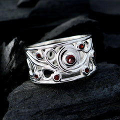 Kristine silver ring featuring red gemstone statement ring with intricate swirling design