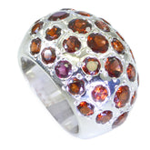 Josephine red gemstone statement ring with multiple round red stones set in silver band