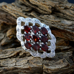 Pauline red gemstone statement ring with multiple oval red stones and ornate silver setting