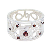 Kristine silver ring featuring intricate design with red gemstone statement ring accents