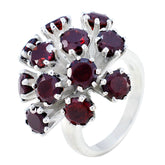 Chloe silver ring featuring multiple red gemstones in a floral design red gemstone statement ring