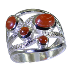 Autumn silver ring featuring multiple red gemstones in an intricate openwork design red gemstone statement ring