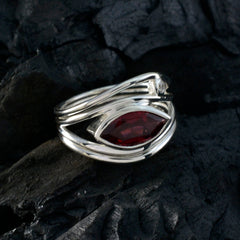 Teresa silver ring featuring a red gemstone toi et moi ring design with marquise-cut stone