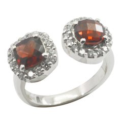 Valentina red gemstone toi et moi ring with two red stones surrounded by small clear gems on silver band
