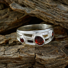 Julieta silver ring with three red gemstones design featuring red gemstone trilogy ring style
