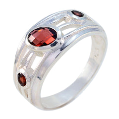 Julieta red gemstone trilogy ring with three red gemstones set in a silver band
