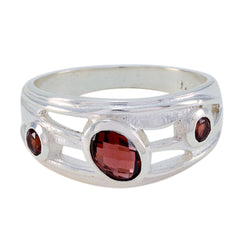 Julieta silver ring featuring a red gemstone trilogy ring design with three faceted red stones