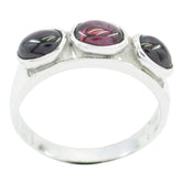 Chen red gemstone trilogy ring with three oval red stones set in silver band