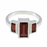 Charlotte silver ring featuring a red gemstone trilogy ring with three rectangular red stones