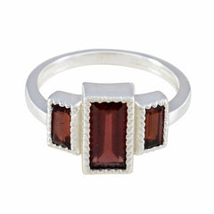 Charlotte silver ring featuring a red gemstone trilogy ring with three rectangular red stones