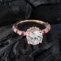 Li Lee red halo gemstone ring with large clear center stone and red accent stones on rose gold band