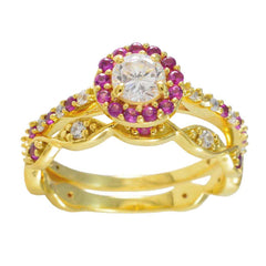 Laura red halo promise ring in gold with central clear stone and surrounding red gemstones